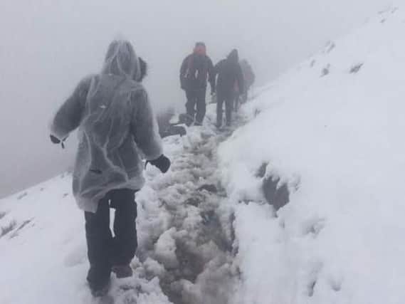 Lost walkers were guided off Kinder Scout