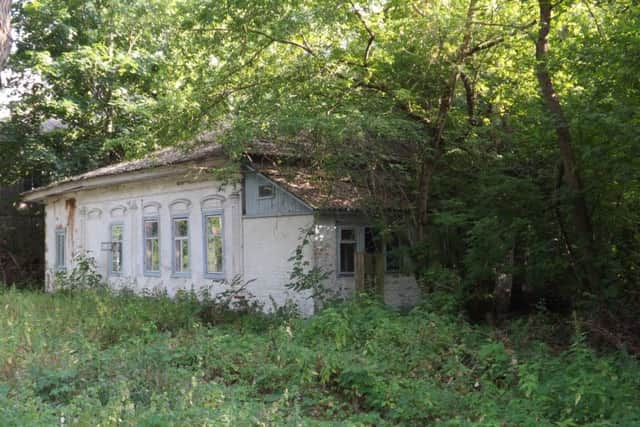 An overgrown building inside the Chernobyl exclusion zone, 2016