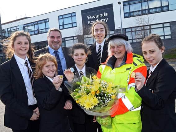 Lollipop lady Marilyn Marsden at Yewlands Academy with students and assistant headteacher Grant Bryce-Stephen (Marie Caley)