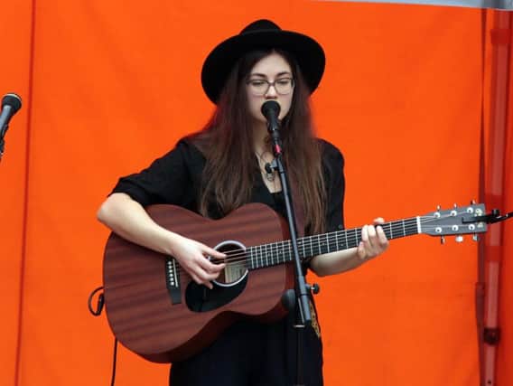 A singer performs for the crowds at SheFest. Picture: Glenn ASHLEY