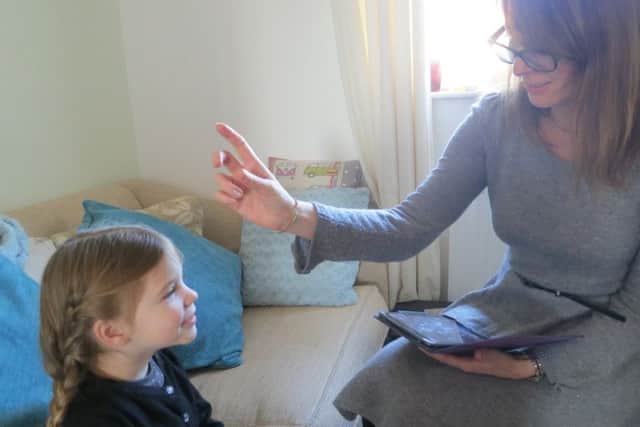 Louise in session with a young girl