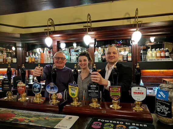 Sheffield Council has listed The University Arms as an asset of community value at the second time of asking. Coun Peter Rippon and Coun Jack Scott are pictured with team manager Billy Taylor.