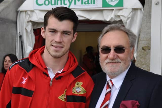 Doncaster Rovers striker John Marquis alongside former striker Peter Kitchen
