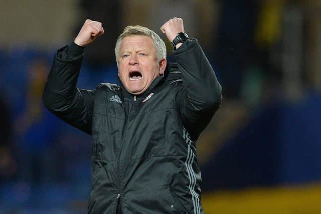 Chris Wilder jumps for joy after another win