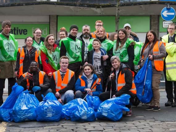 McDonald's staff with some of the bags of litter they collected in Sheffield city centre