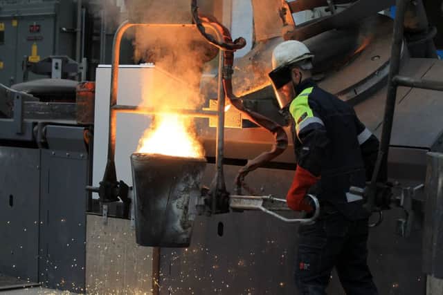 Pouring molten metal at William Cook Cast Products in Sheffield. Picture: Chris Etchells