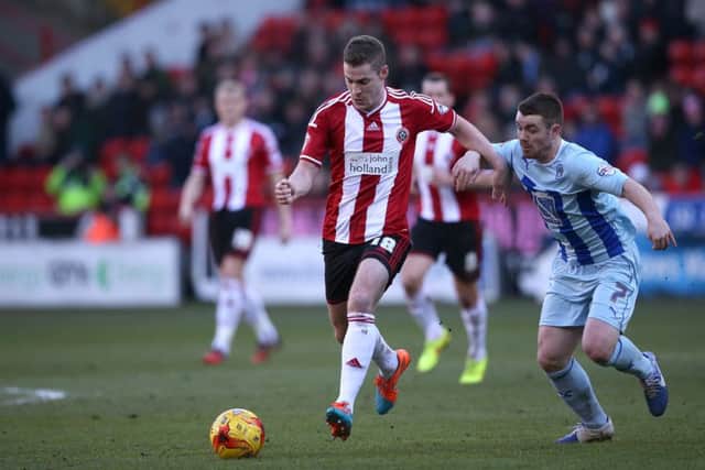 Paul Coutts plays against John Fleck : Blades Sports Photography