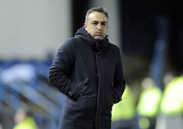 Owls Carlos Carvalhal on the touch line against Reading....Pic Steve Ellis