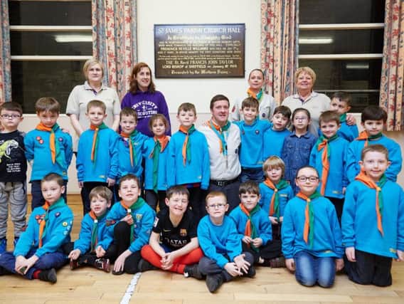James Varns pictured with Claire Williams, the Scout group leader, with helpers and Scouts