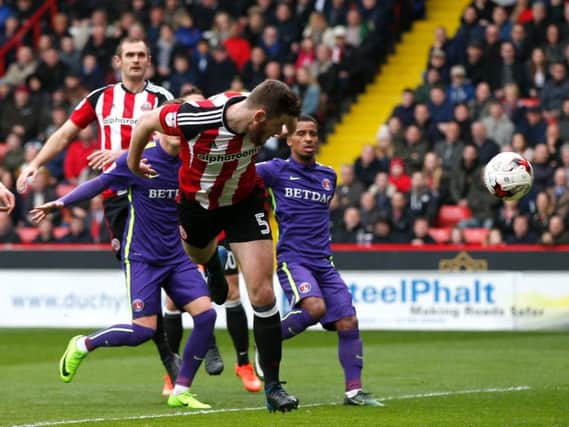 Jack O'Connell heads in the equaliser for Sheffield United against Charlton. Pic: SPORTIMAGE