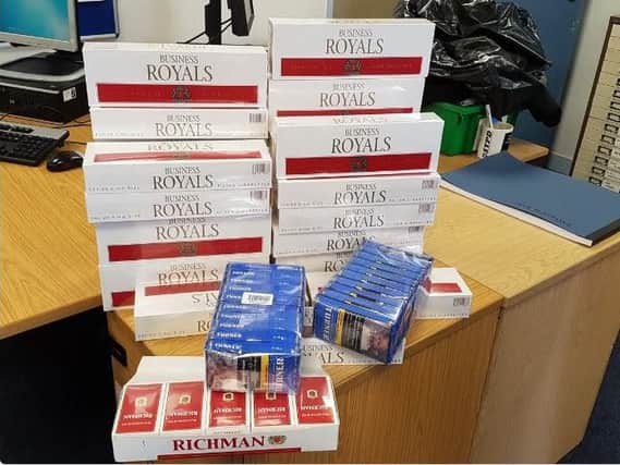 Illegal cigarettes and tobacco were seized by police officers