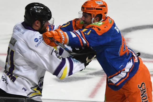Sheffield Steelers' Mike Ratchuk and Manchester Storm's Patrik Valcak fight on the ice. Picture: Andrew Roe