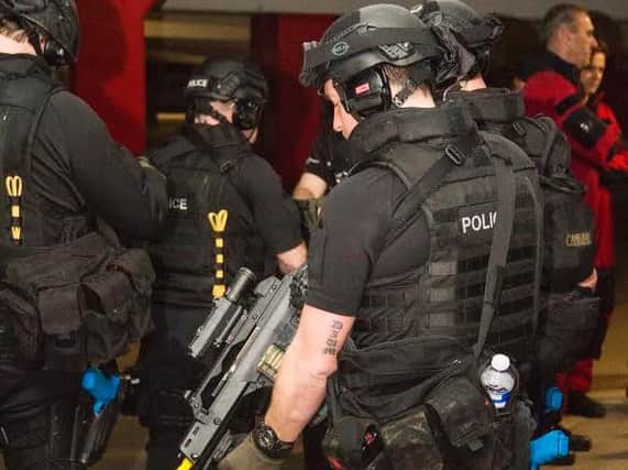 Armed police respond to the exercise (s)