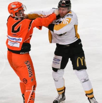 Anders Franzon clashes with Nottingham's Jeff Brown