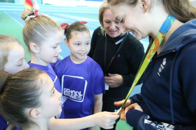 Rotherham pupils admire Bryony Page's silver medal from Rio