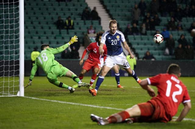 Scotland's Jordan Rhodes misses a late chance to score during the International Friendly match at Easter Road, Edinburgh. Andrew Milligan/PA Wire