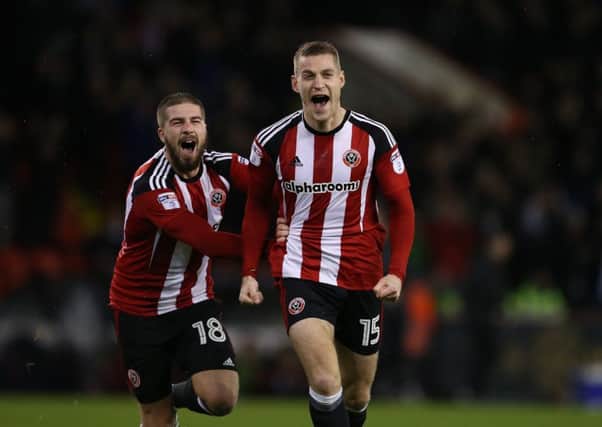 Paul Coutts (front) and Kieron Freeman are two of the first names on Sheffield United's team sheet. Pic Simon Bellis/Sportimage