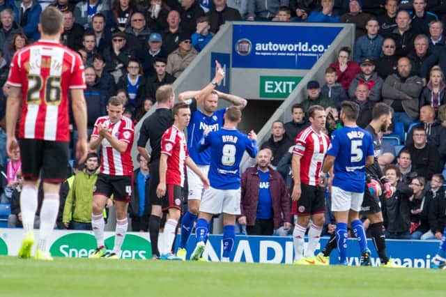 Chesterfield vs Sheffield United - Captain Ian Evatt shows his disappointment as Goalkeeper Tommy Lee sees red Pic By James Williamson