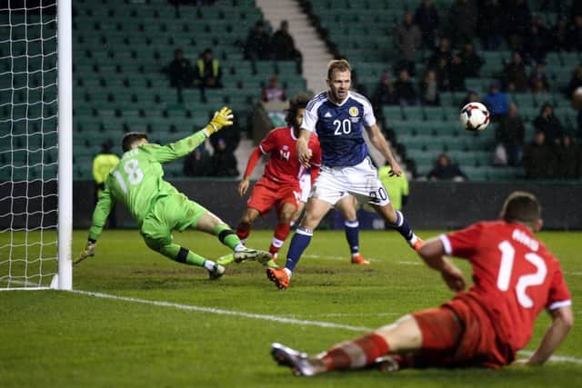 Scotland's Jordan Rhodes misses a late chance to score during the International Friendly match at Easter Road, Edinburgh. Andrew Milligan/PA Wire.