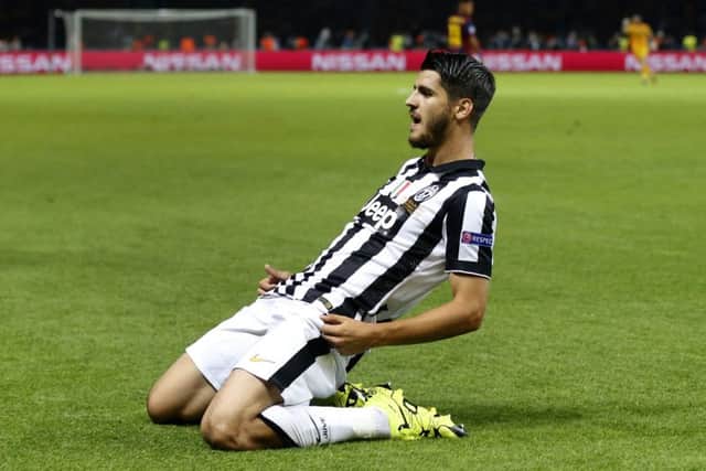 Juventus' Alvaro Morata celebrates after scoring his sides first goal during the Champions League final