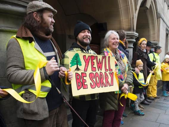 Tree campaigners ring Sheffield Town Hall.