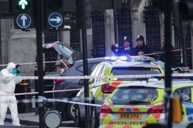Police on the scene after the attack. Picture: PA