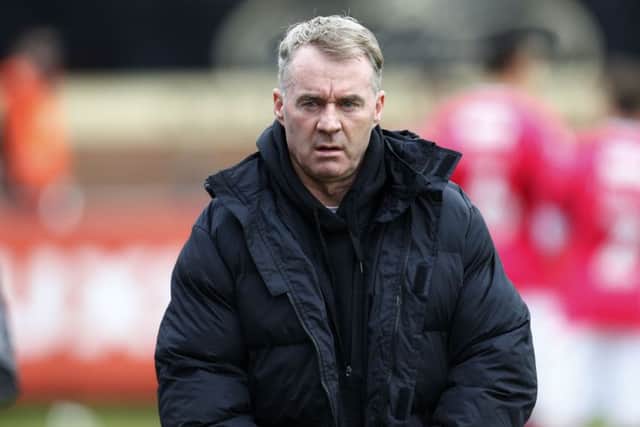 Oldham Athletic manager and former Sheffield Wednesday midfielder John Sheridan