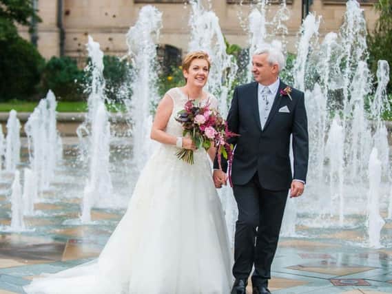 The couple on their wedding day in October 2016