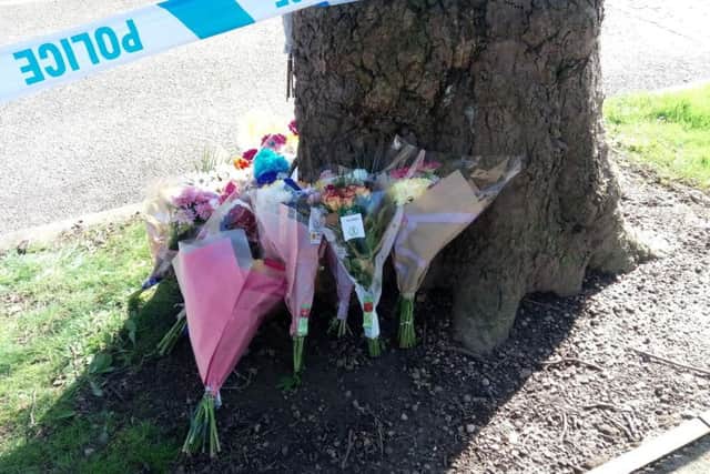 Floral tributes close to the scene of the fatal stabbing