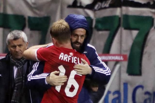 Canada's Scott Arfield embraces Scotland's Steven Fletcher after the International Friendly match at Easter Road