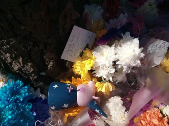 Floral tributes close to the scene of the fatal stabbing