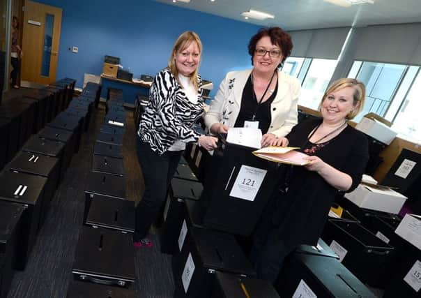 Doncaster's Council's chief executive and Mayoral election returning officer Jo Miller (centre) and election team members Tina Knight (left) and Sara Youngs are pictured surrounded by ballot boxes at the Council's Civic Office.