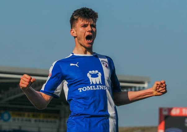Chesterfield forward Joe Rowley celebrates a goal to remember.