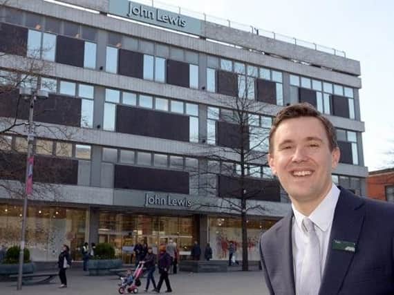 Tom Holmes in front of John Lewis store