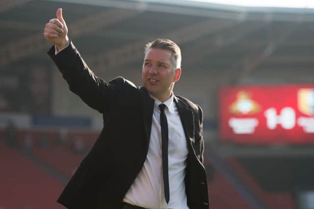 Doncaster Rovers Manager Darren Ferguson celebrates promotion after the Mansfield match. Photo: Jon Buckle/PA