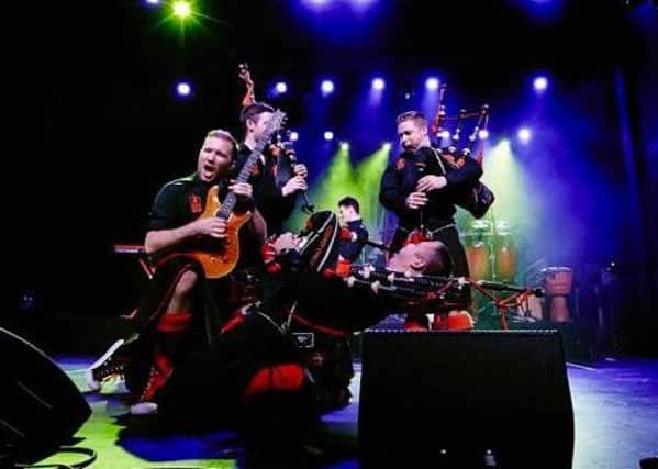 The Red Hot Chilli Pipers in action.