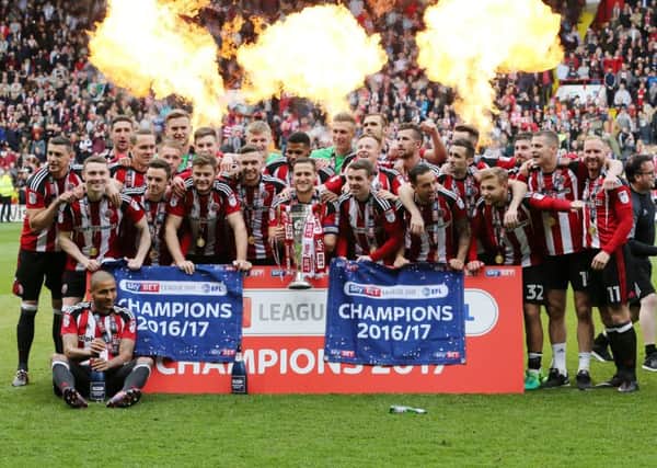 Sheffield United's players celebrate with the League One trophy  Pic David Klein/Sportimage