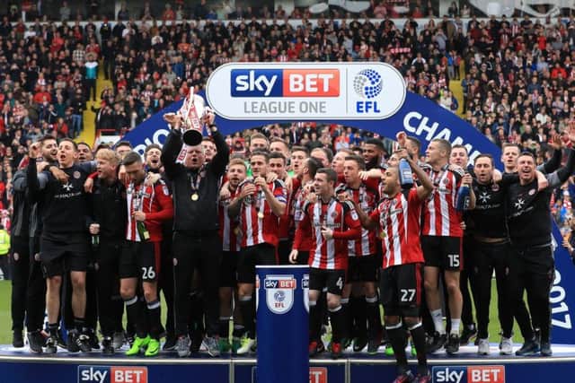 Sheffield United lifted the League One championship trophy on Sunday