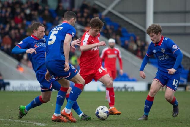 Oldham vs Chesterfield - Jake Orrell looks for a way past - Pic By James Williamson