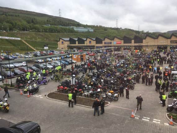 Bikers gather at Fox Valley for the funeral parade of Sam Pickering