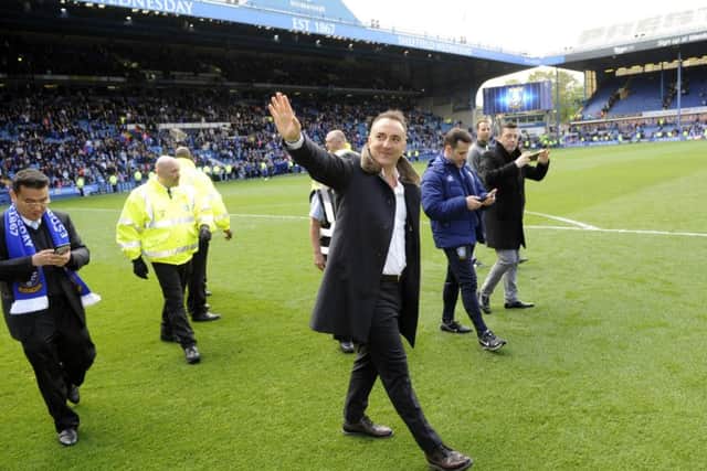 Carlos Carvalhal waves to the crowd on Wednesday's lap of appreciation