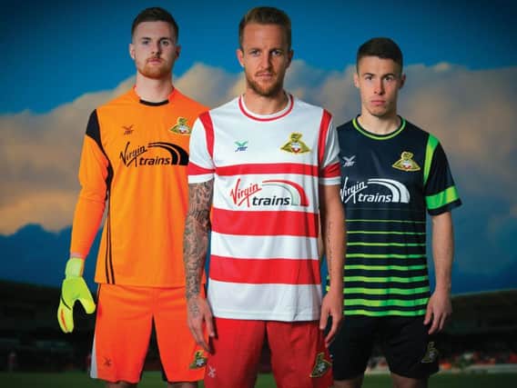 Ian Lawlor, James Coppinger and Tommy Rowe model Rovers' new kits for next season