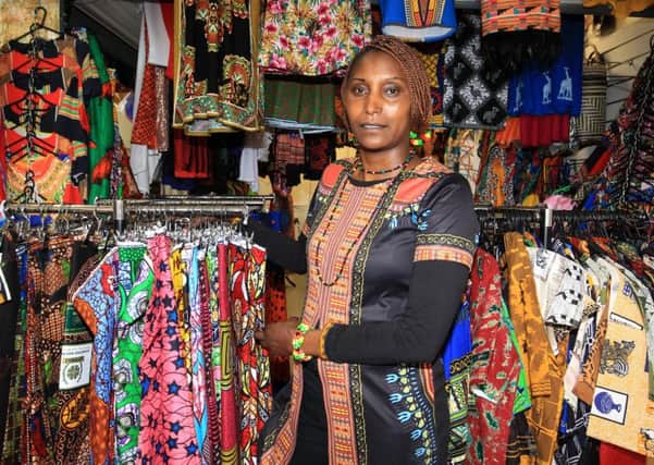 City buzz shopping at The Moor Market. Pictured from Mhacagi is Nengarivo Mollel.