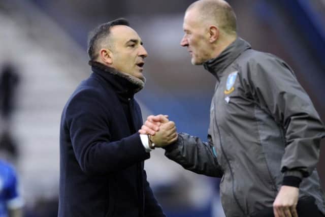 Owls boss Carlos Carvalhal with coach Lee Bullen following the 5-1 win over Norwich City at Hillsborough on Saturday