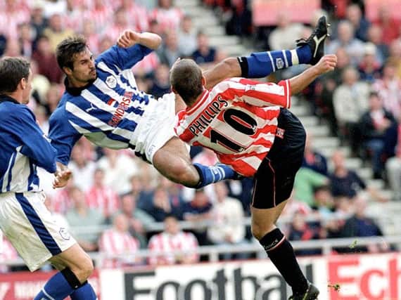 Emerson Thome of Sheffield Wednesday (left) and Kevin Phillips of Sunderland