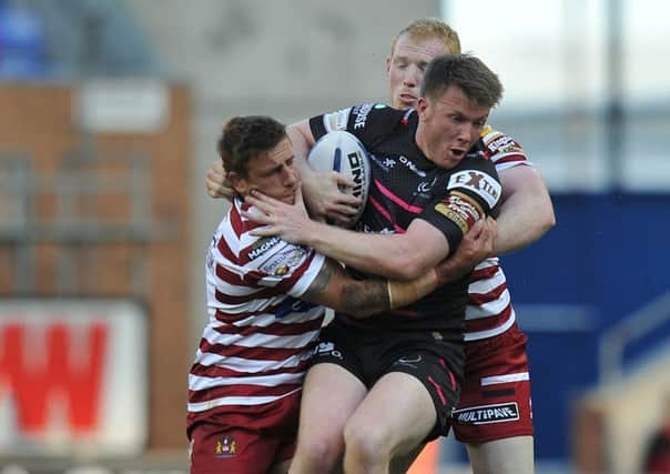 Widnes Vikings' Paddy Flynn is tackled