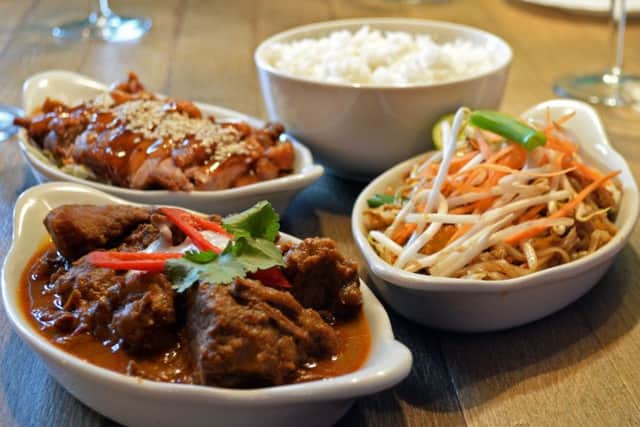 A main course from the set meal for two, featuring Massaman Curry (Beef), Pak Pad Thai (Noodles) and Ped Lad Nummakam (Roast Duck).  Picture: Marie Caley NDFP Thai at Sal MC 7