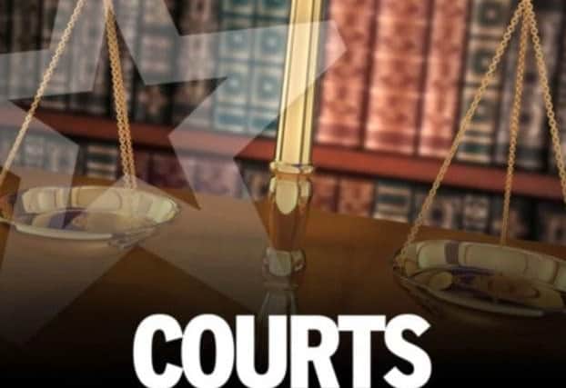 A controlling Doncaster man viciously attacked his ex-girlfriend in the street and threatened to cut her from 'ear to mouth' after their relationship ended, a court heard.