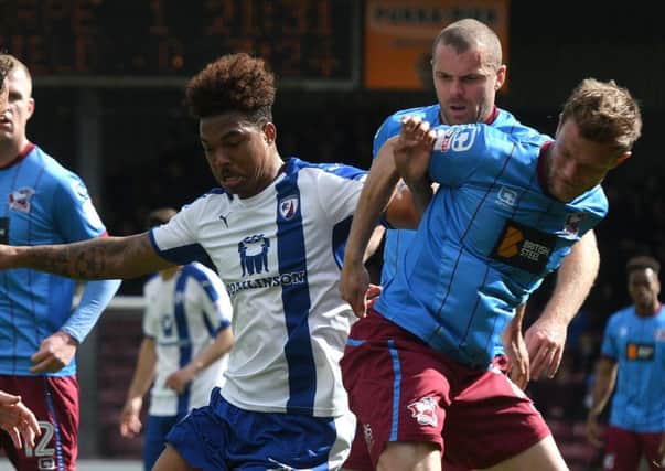 Picture Andrew Roe/AHPIX LTD, Football, EFL Sky Bet League One, Scunthorpe United v Chesterfield Town, Glanford Park, 17/04/17, K.O 3pm

Chesterfield's Rai Simons battles with Scunthorpe's Scott Wiseman

Andrew Roe>>>>>>>07826527594
