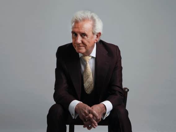 A message from artist Tony Christie appears in the video